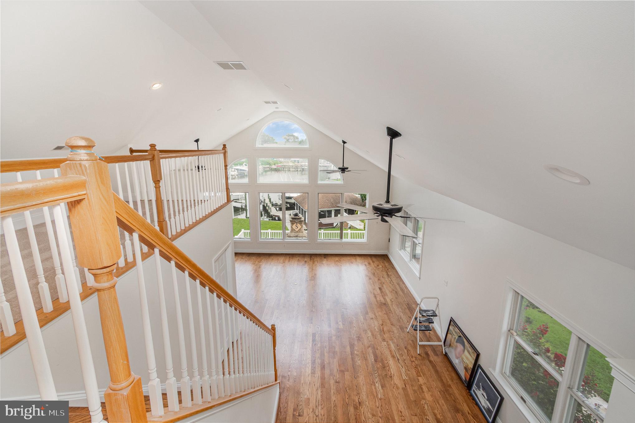 70 Johnson Road Pasadena, MD 21122 - Photo 22 of 35 a view of deck and living room with wooden floor