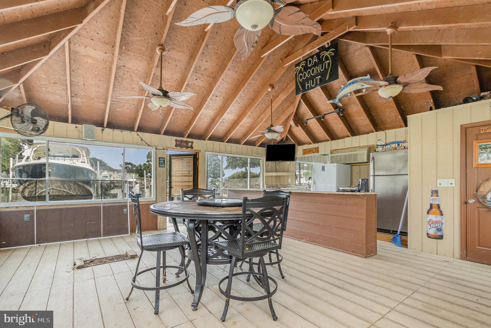 70 Johnson Road Pasadena, MD 21122 - Photo 30 of 35 a view of a table and chairs in patio