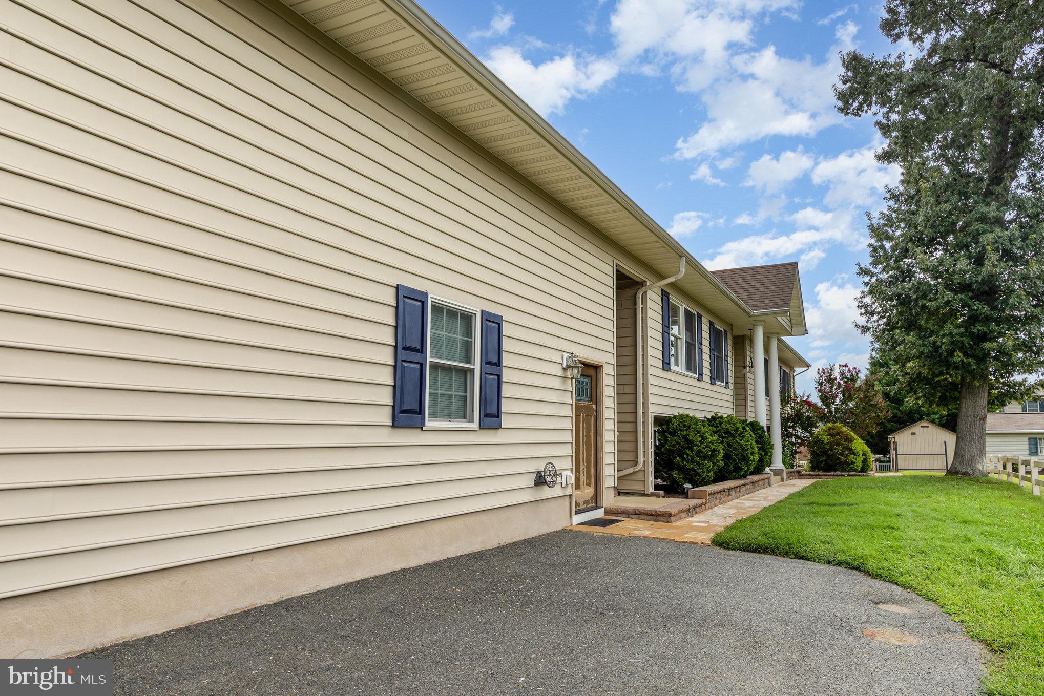 70 Johnson Road Pasadena, MD 21122 - Photo 3 of 35 a view of a house with a backyard