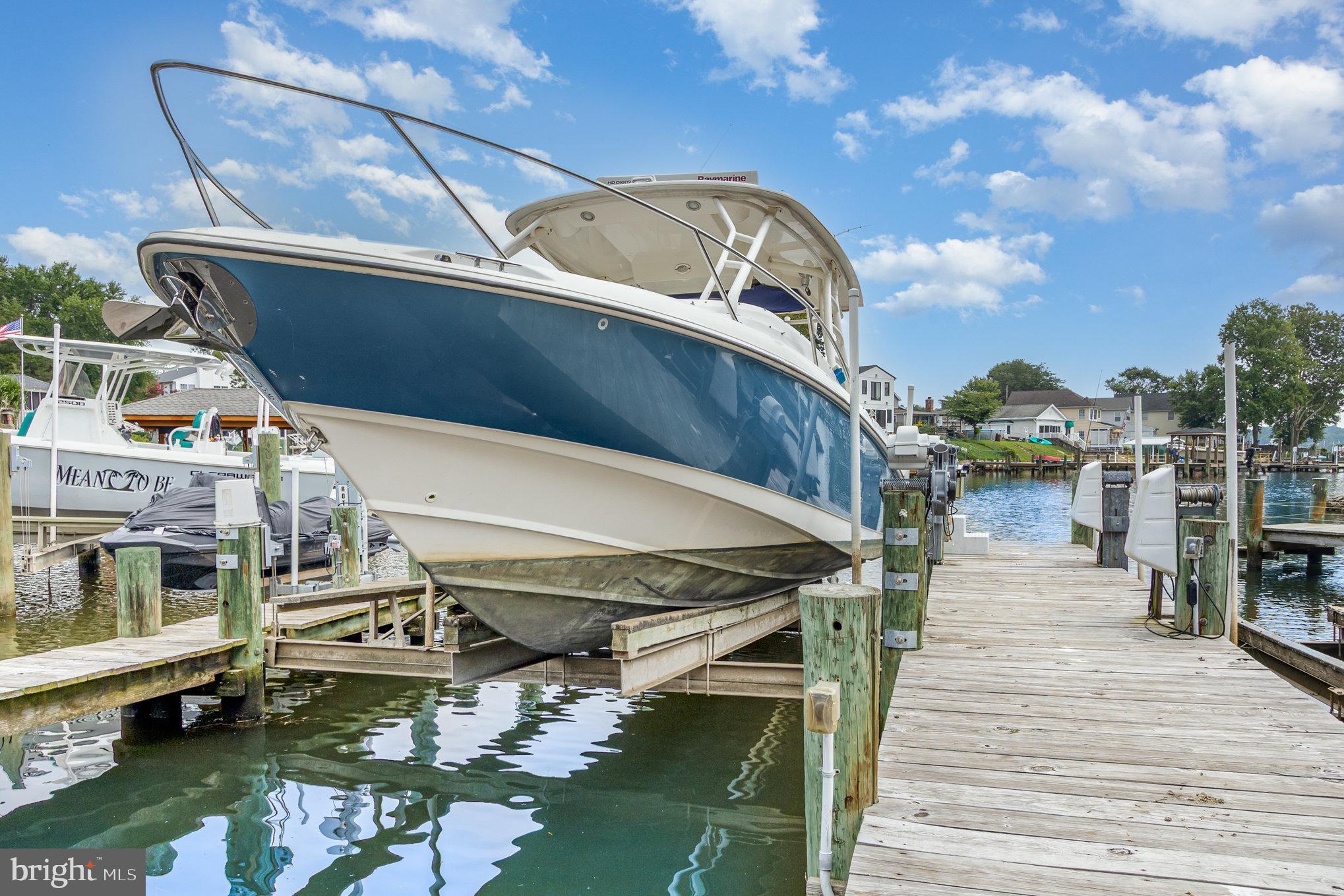 70 Johnson Road Pasadena, MD 21122 - Photo 34 of 35 a roof deck view with a barbeque grill and plants