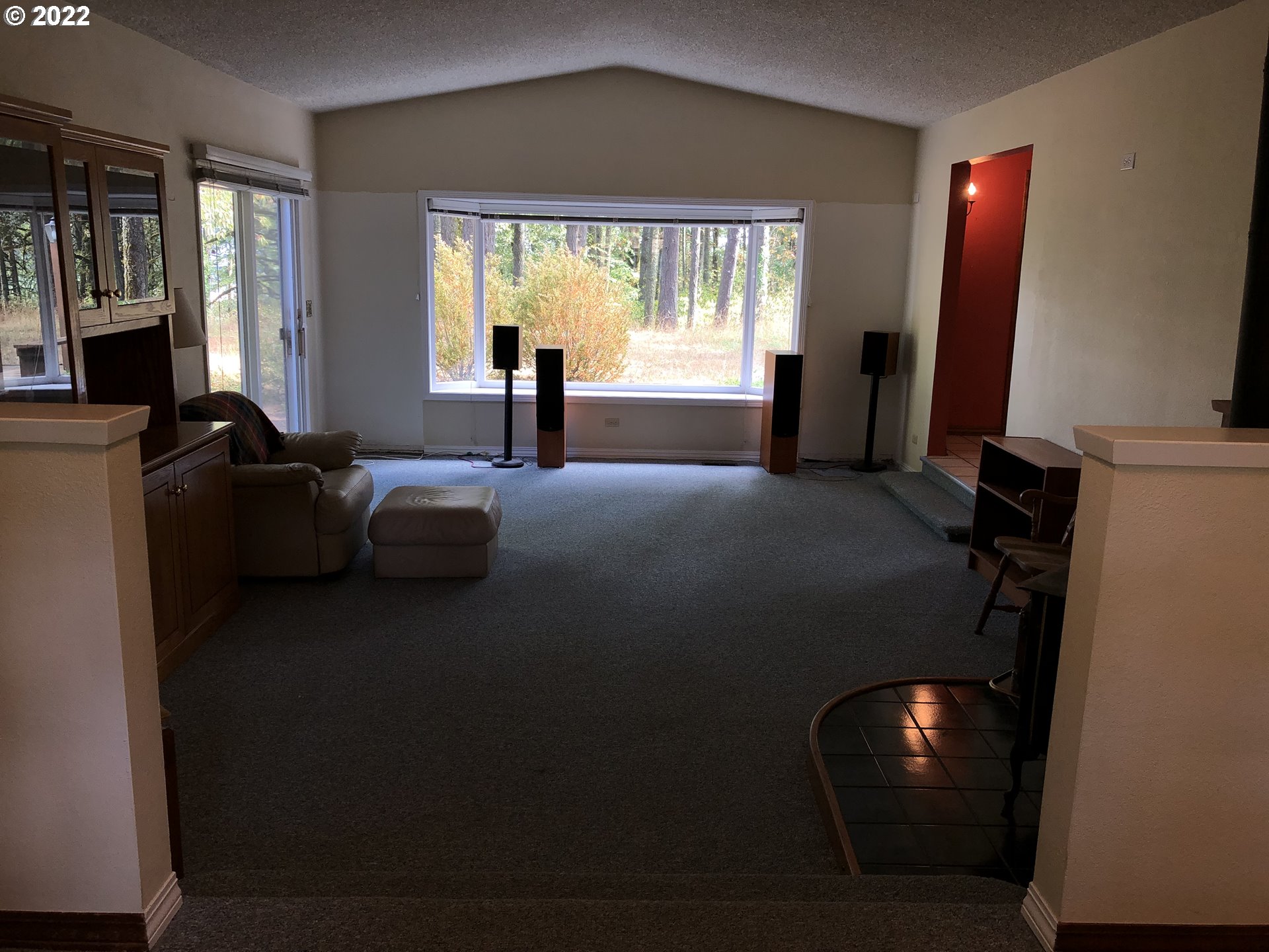 2545 James Howe Road Dallas, OR 97338 - Photo 20 of 31 a living room with furniture and a flat screen tv