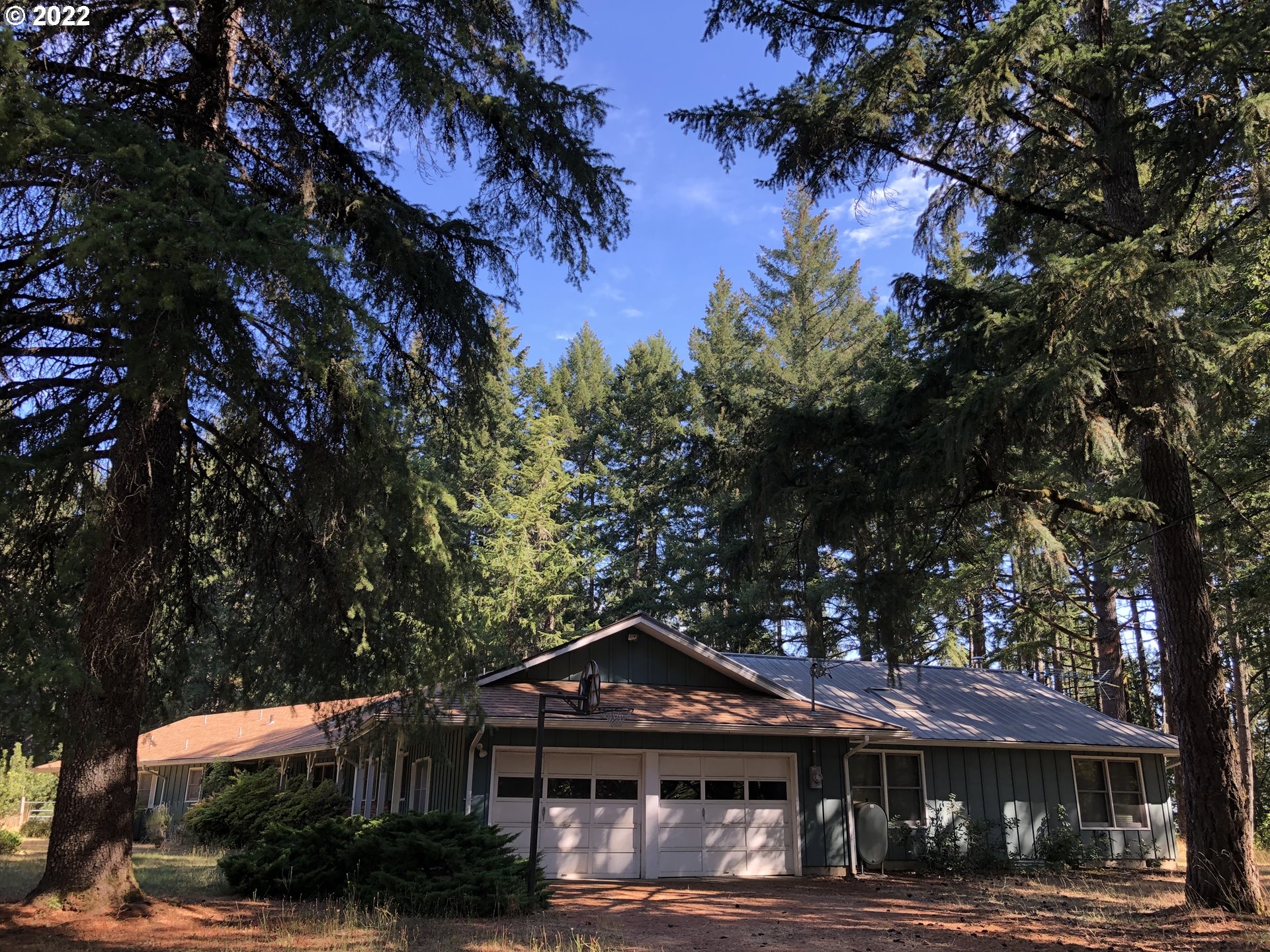 2545 James Howe Road Dallas, OR 97338 - Photo 4 of 31 a front view of a house with a yard