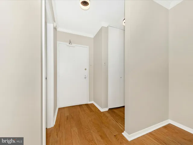 a view of bedroom and hallway