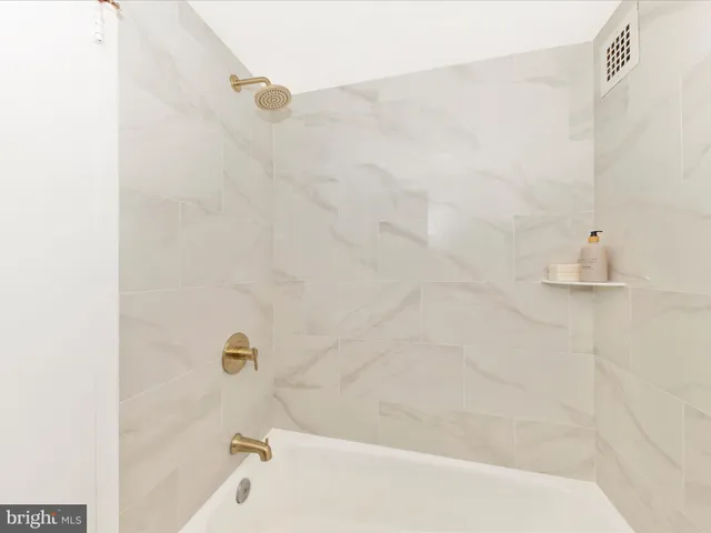 a bathroom with a bathtub