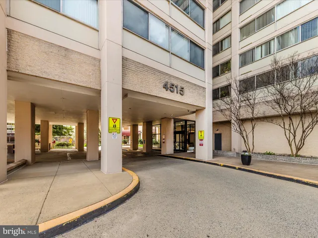 a view of a building with a street