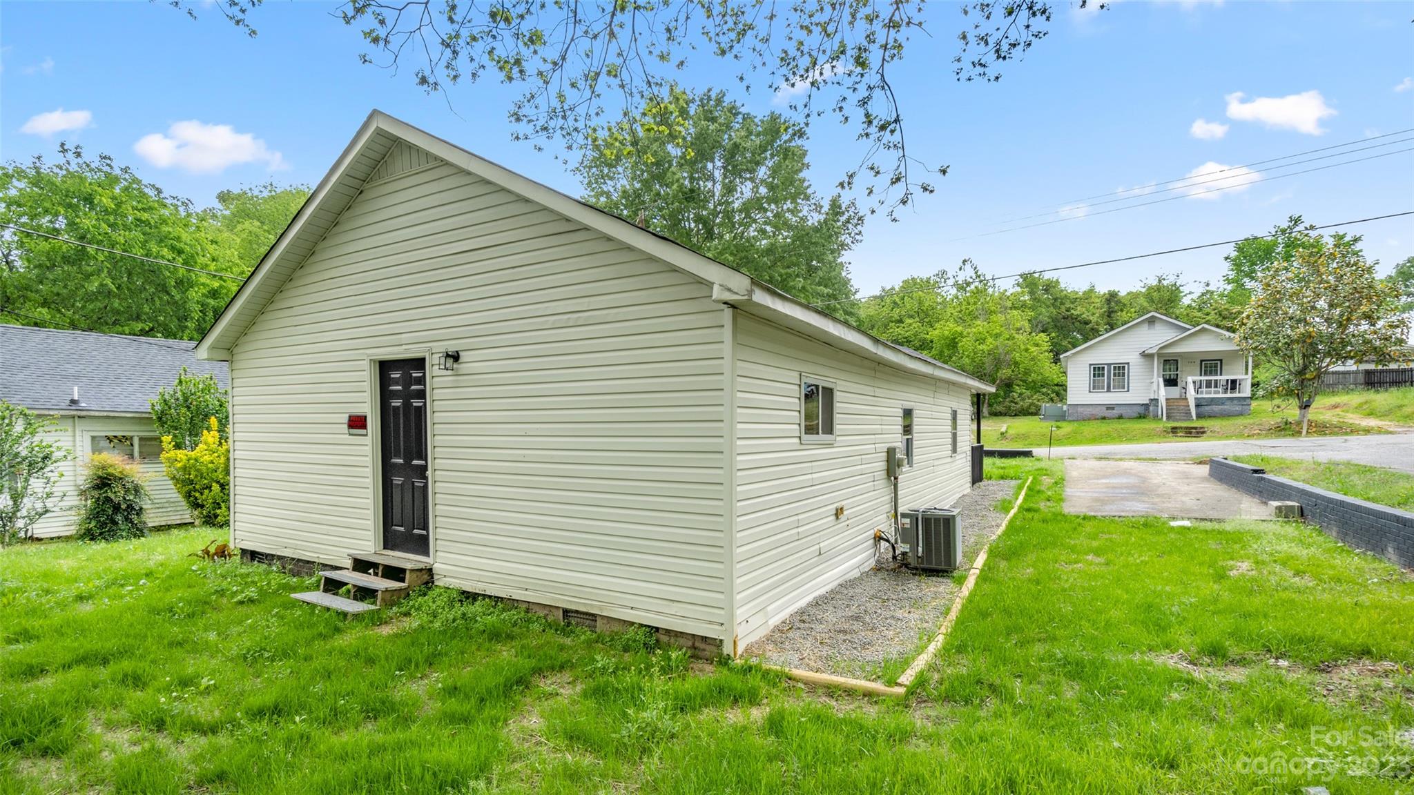 705 Sumter Street Lancaster, SC 29720 - Photo 14 of 16 a view of a backyard with a garden