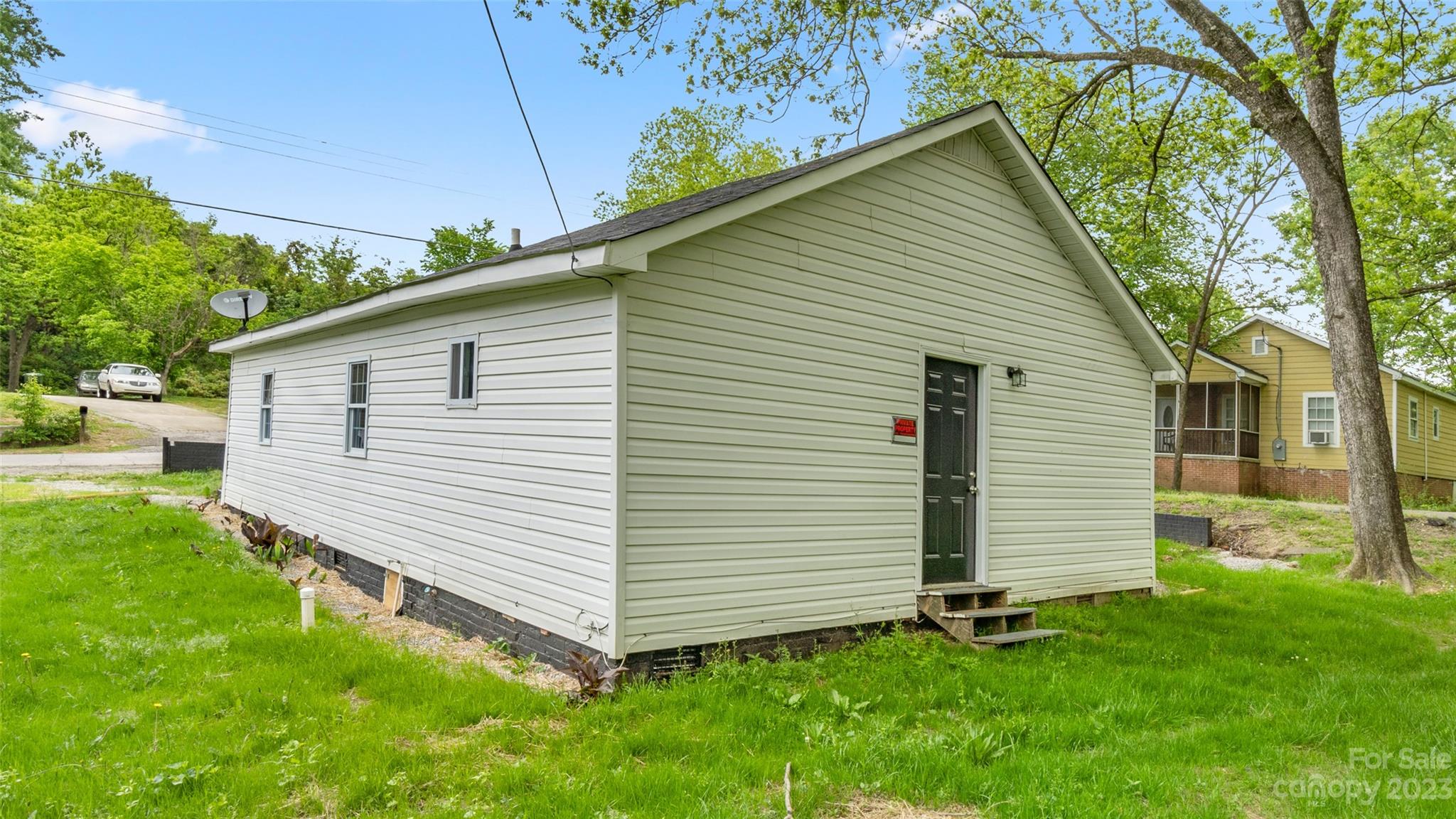 705 Sumter Street Lancaster, SC 29720 - Photo 15 of 16 a view of a house with a yard