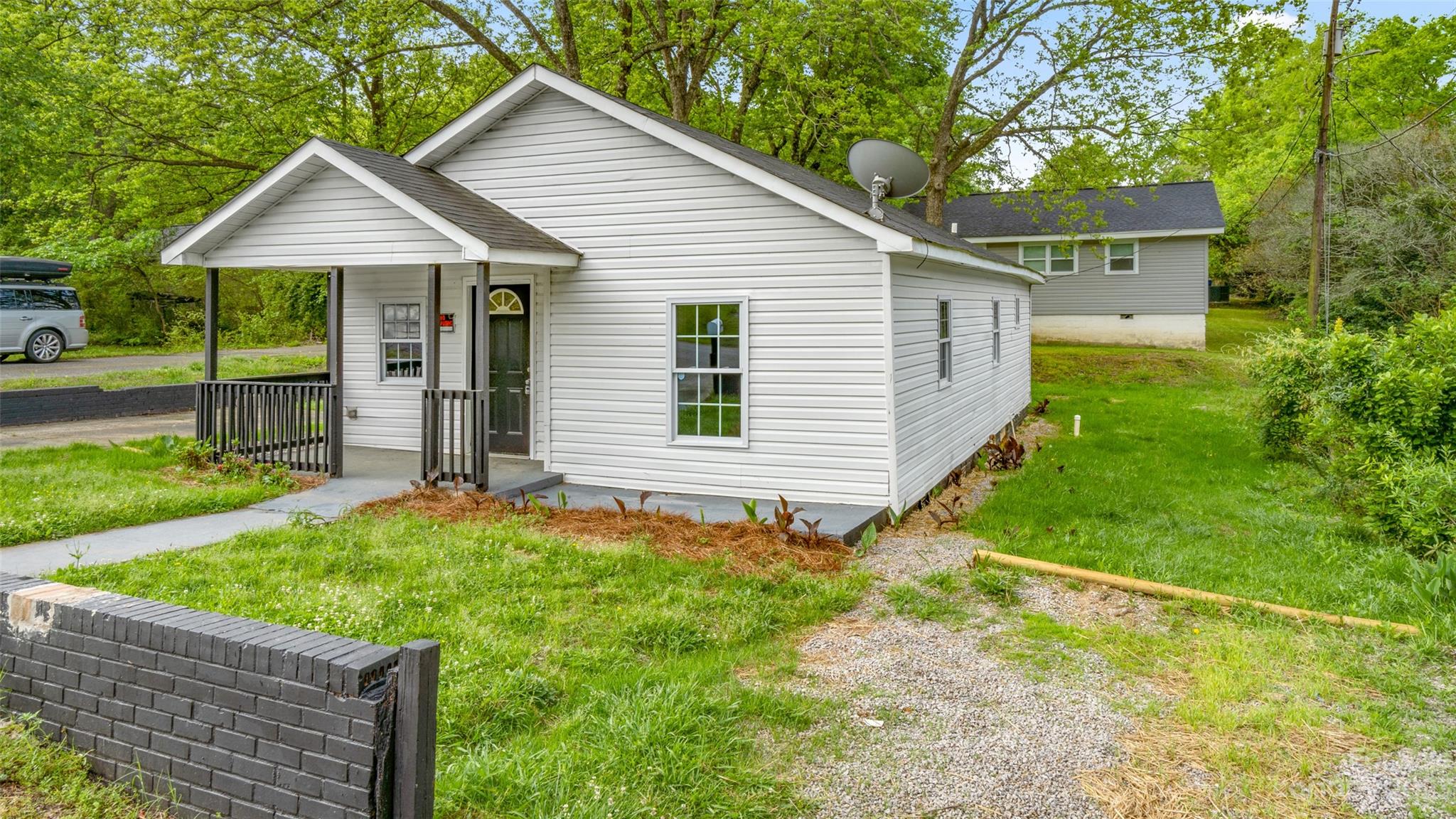 705 Sumter Street Lancaster, SC 29720 - Photo 2 of 16 a view of a house with backyard and garden
