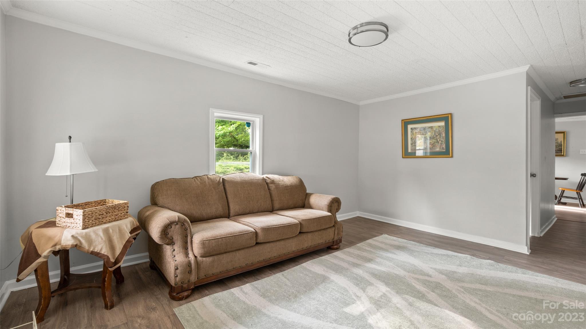 705 Sumter Street Lancaster, SC 29720 - Photo 6 of 16 a living room with furniture and a window