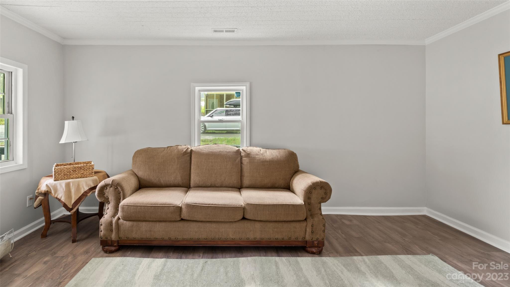705 Sumter Street Lancaster, SC 29720 - Photo 7 of 16 a living room with furniture and a window