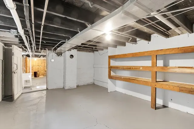 a view of an empty room with a garage