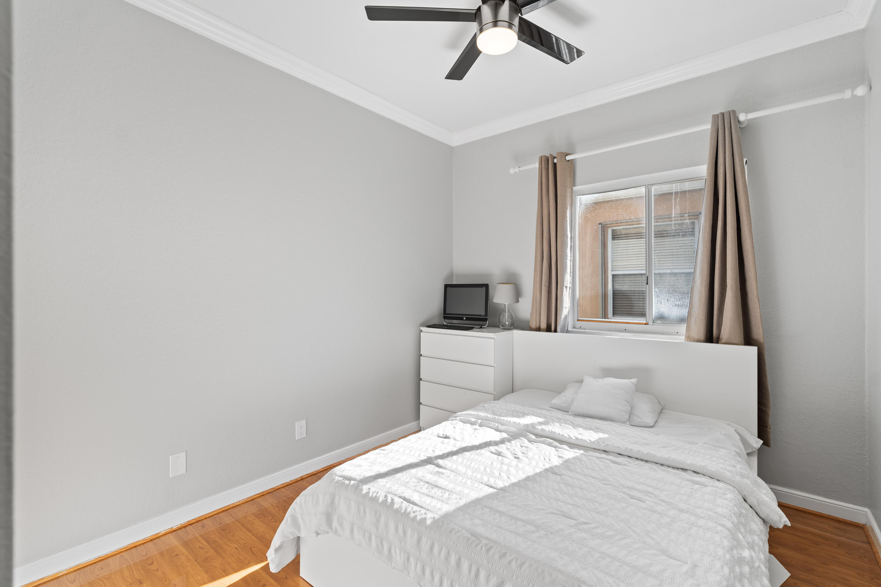 13461 Southwest 29th Street Miramar, FL 33027 - Photo 13 of 54 a bedroom with a bed and a window