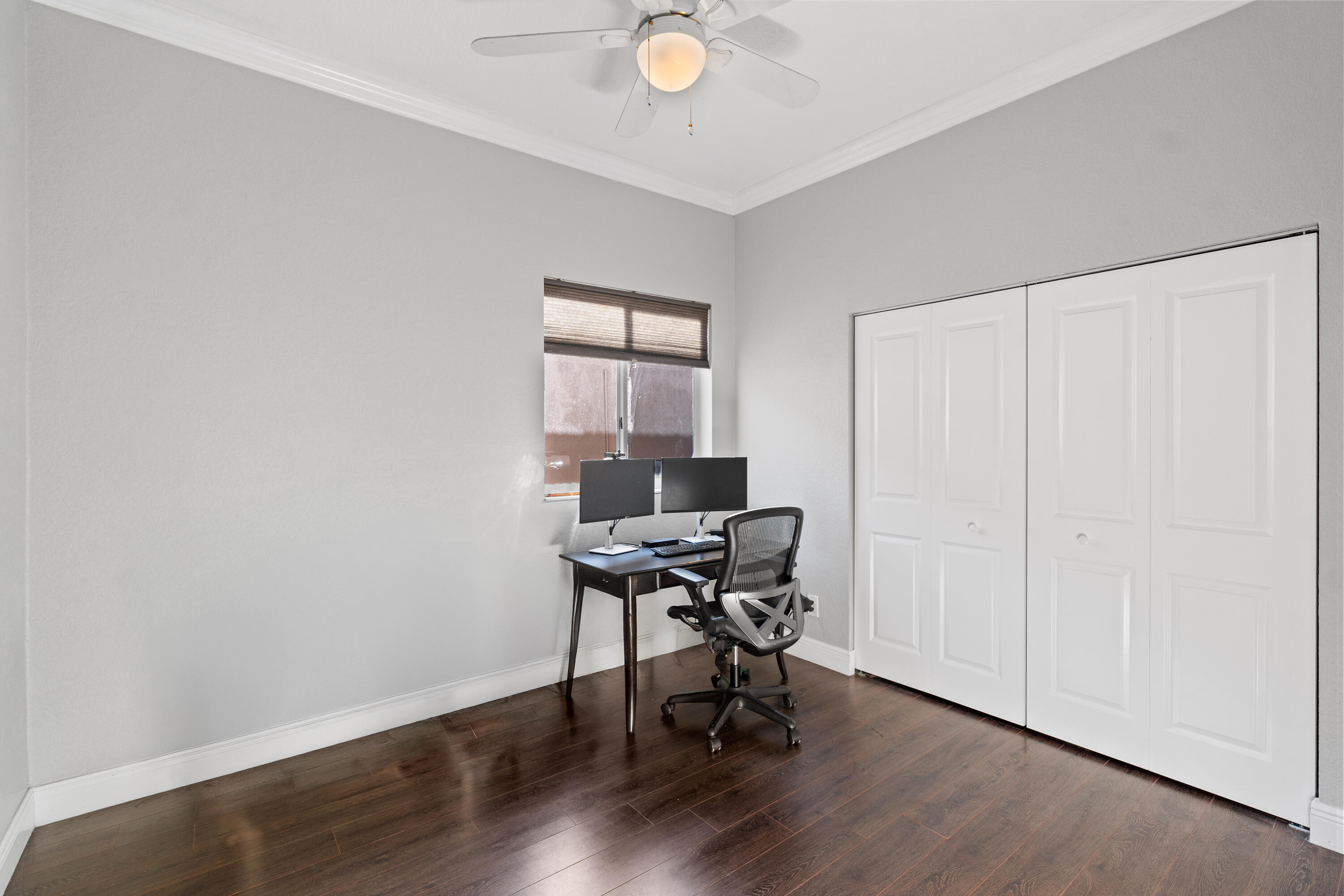 13461 Southwest 29th Street Miramar, FL 33027 - Photo 18 of 54 a workspace with furniture and wooden floor