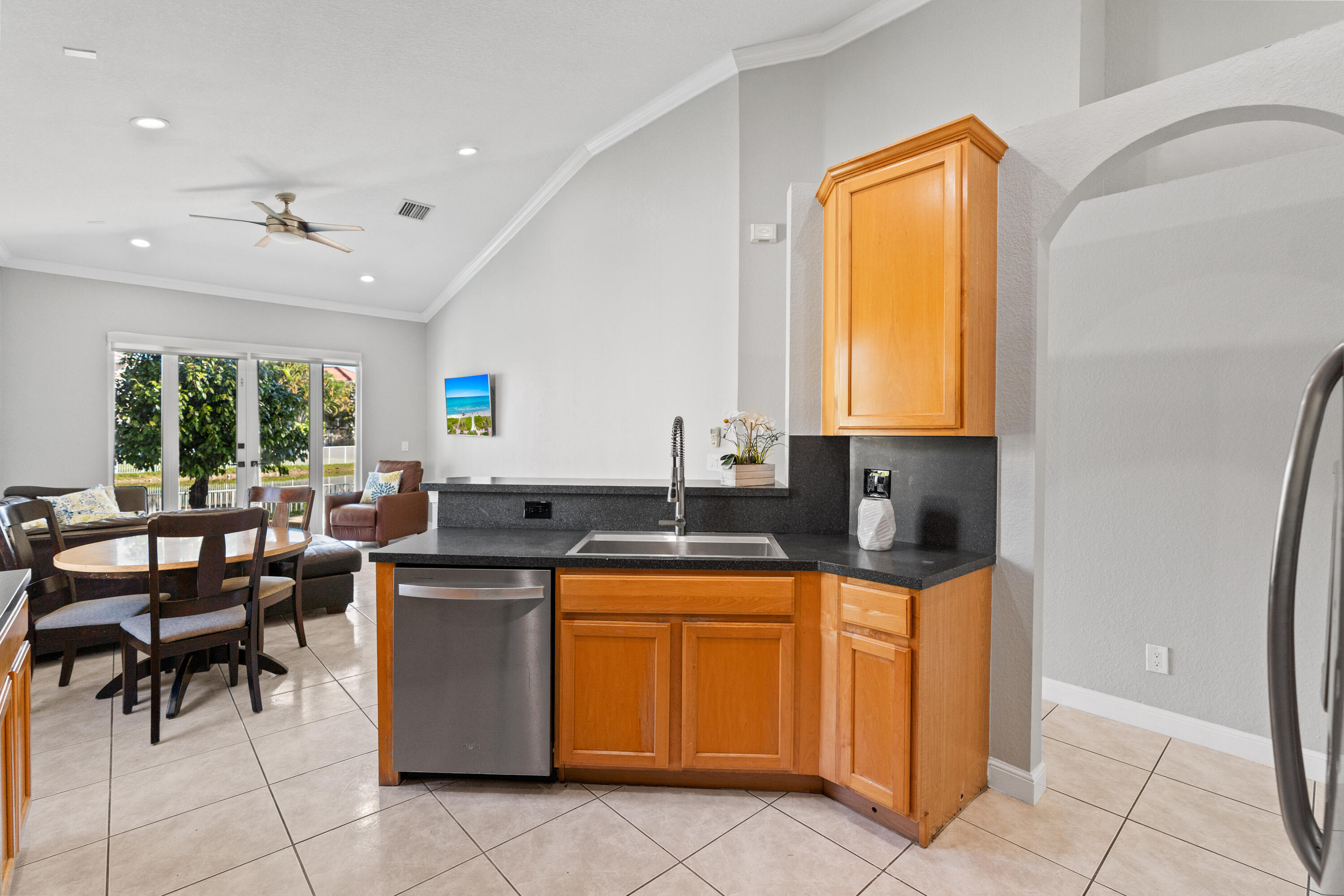 13461 Southwest 29th Street Miramar, FL 33027 - Photo 25 of 54 a kitchen with a sink a counter top space and appliances