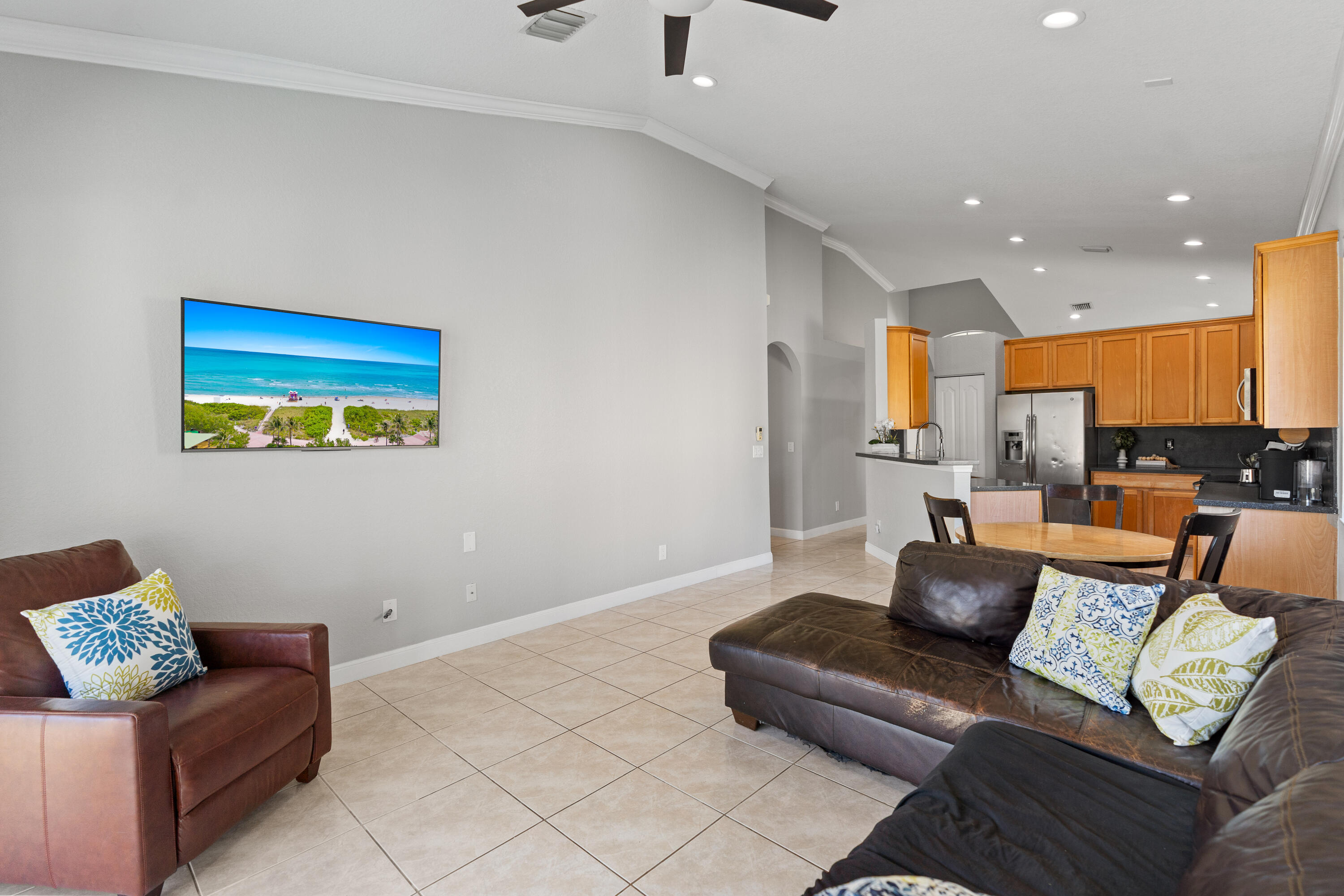 13461 Southwest 29th Street Miramar, FL 33027 - Photo 27 of 54 a living room with furniture and a view of kitchen