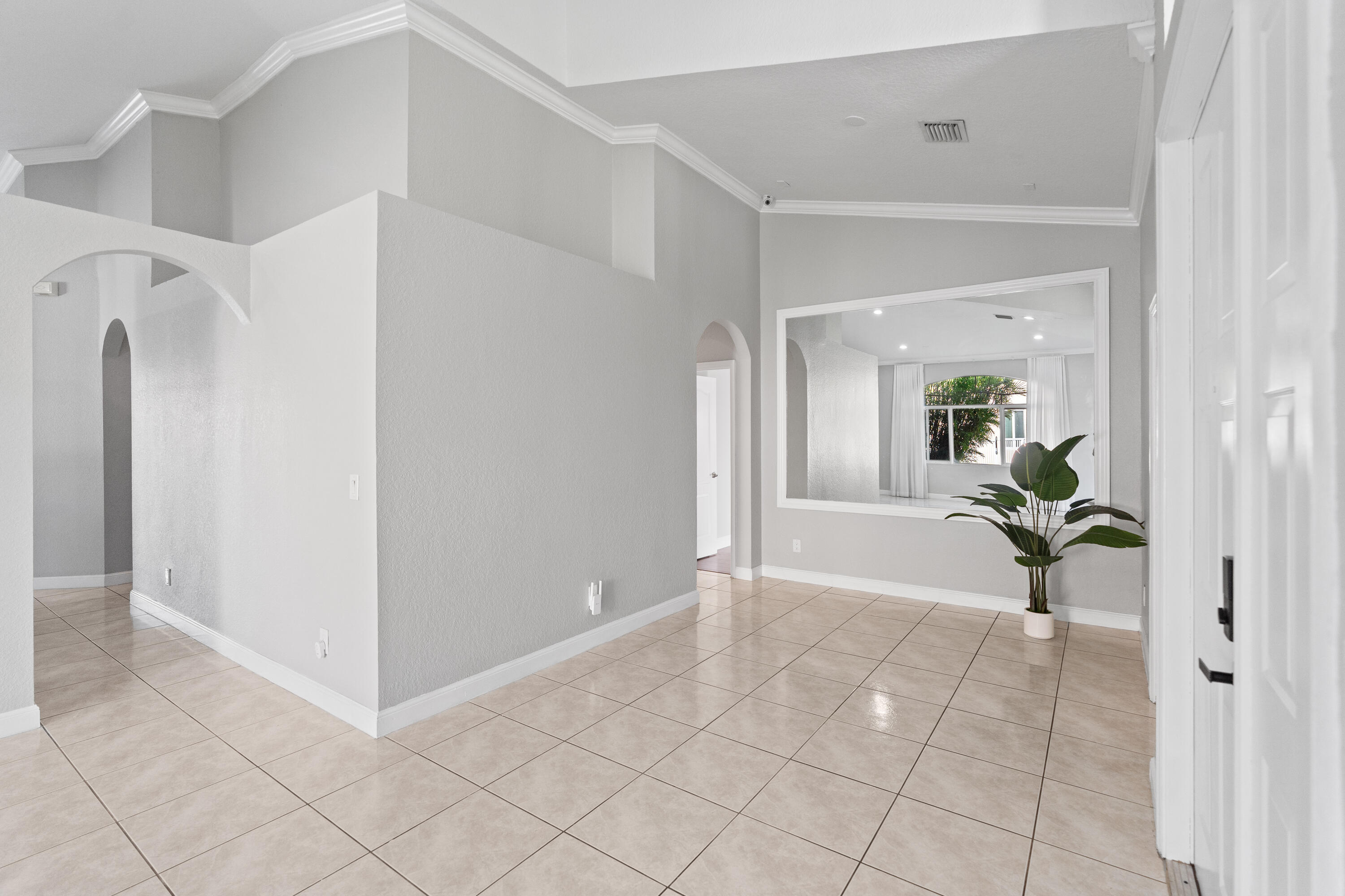 13461 Southwest 29th Street Miramar, FL 33027 - Photo 30 of 54 a view of a hallway view with three rooms
