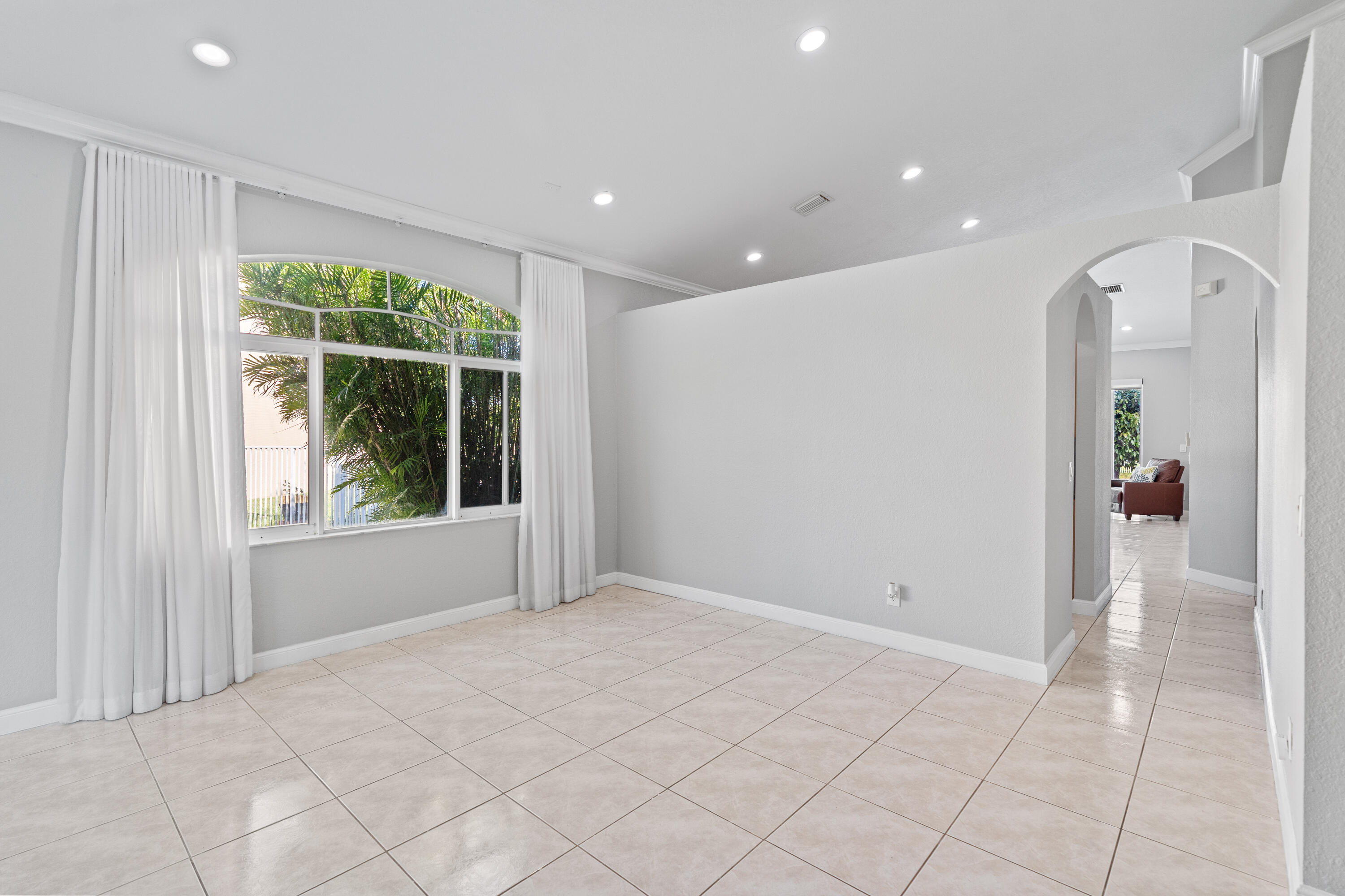 13461 Southwest 29th Street Miramar, FL 33027 - Photo 31 of 54 a view of an empty room with a window