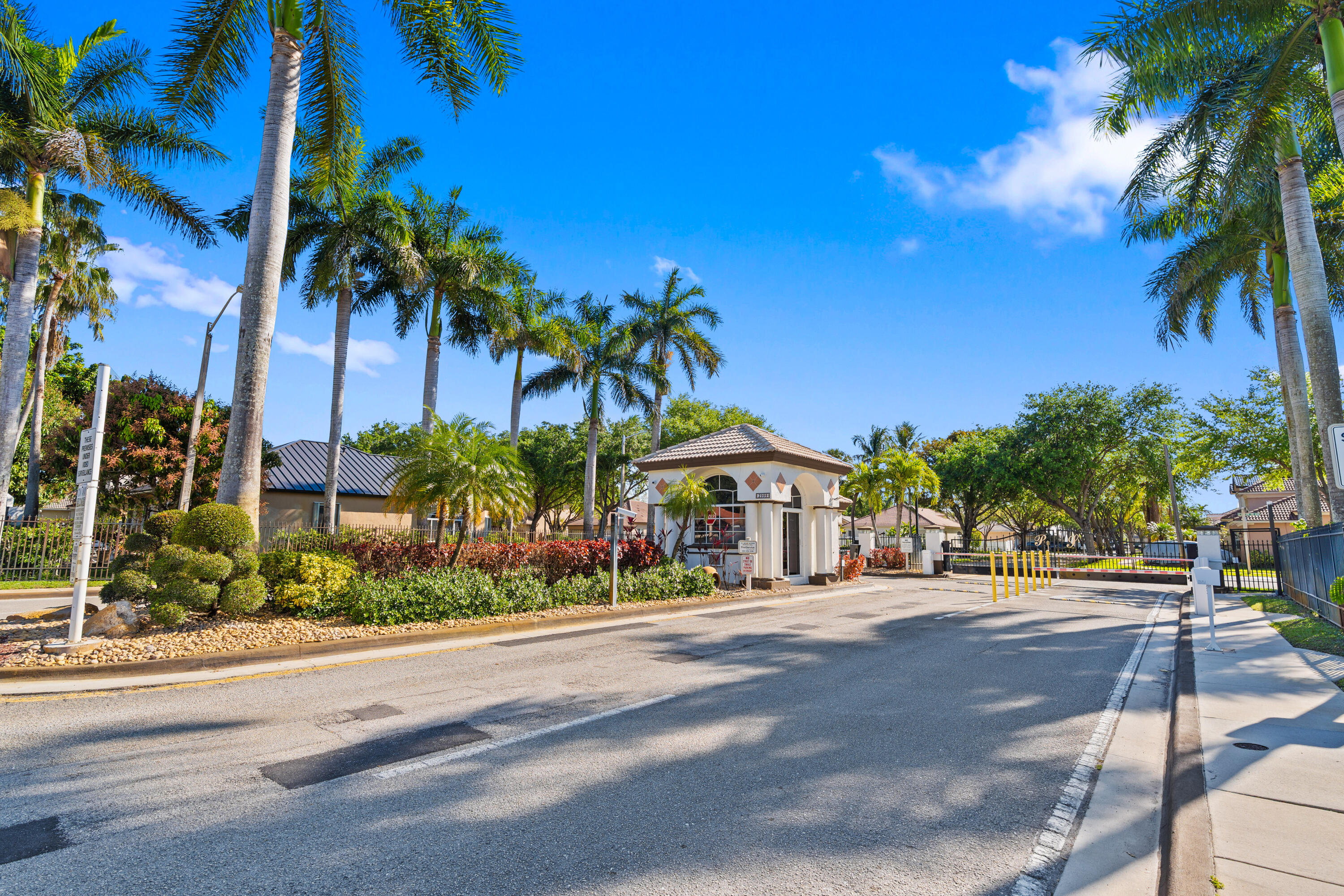 13461 Southwest 29th Street Miramar, FL 33027 - Photo 46 of 54 a street view with tall buildings and a street view