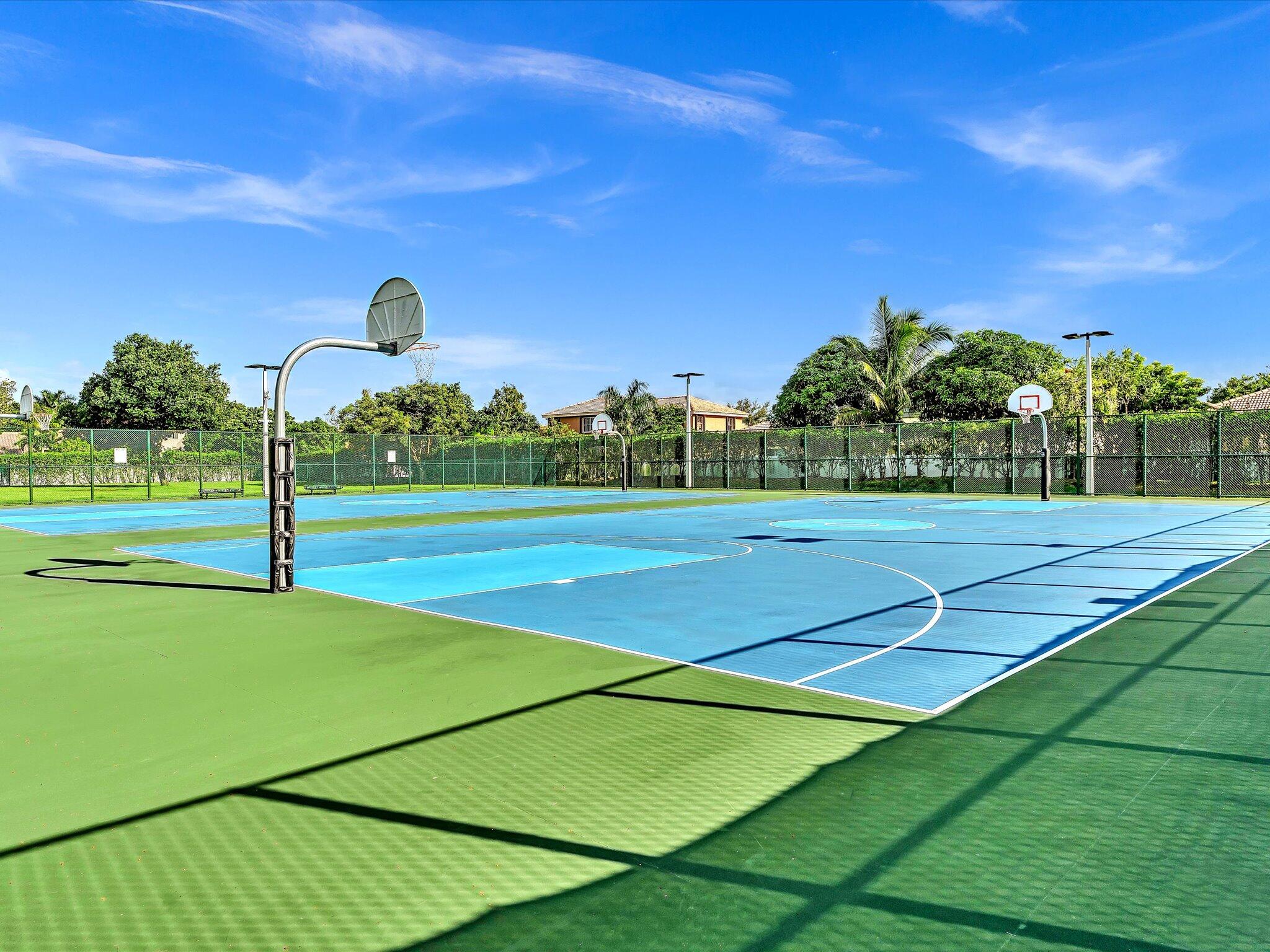 13461 Southwest 29th Street Miramar, FL 33027 - Photo 50 of 54 a view of an outdoor space and tennis court
