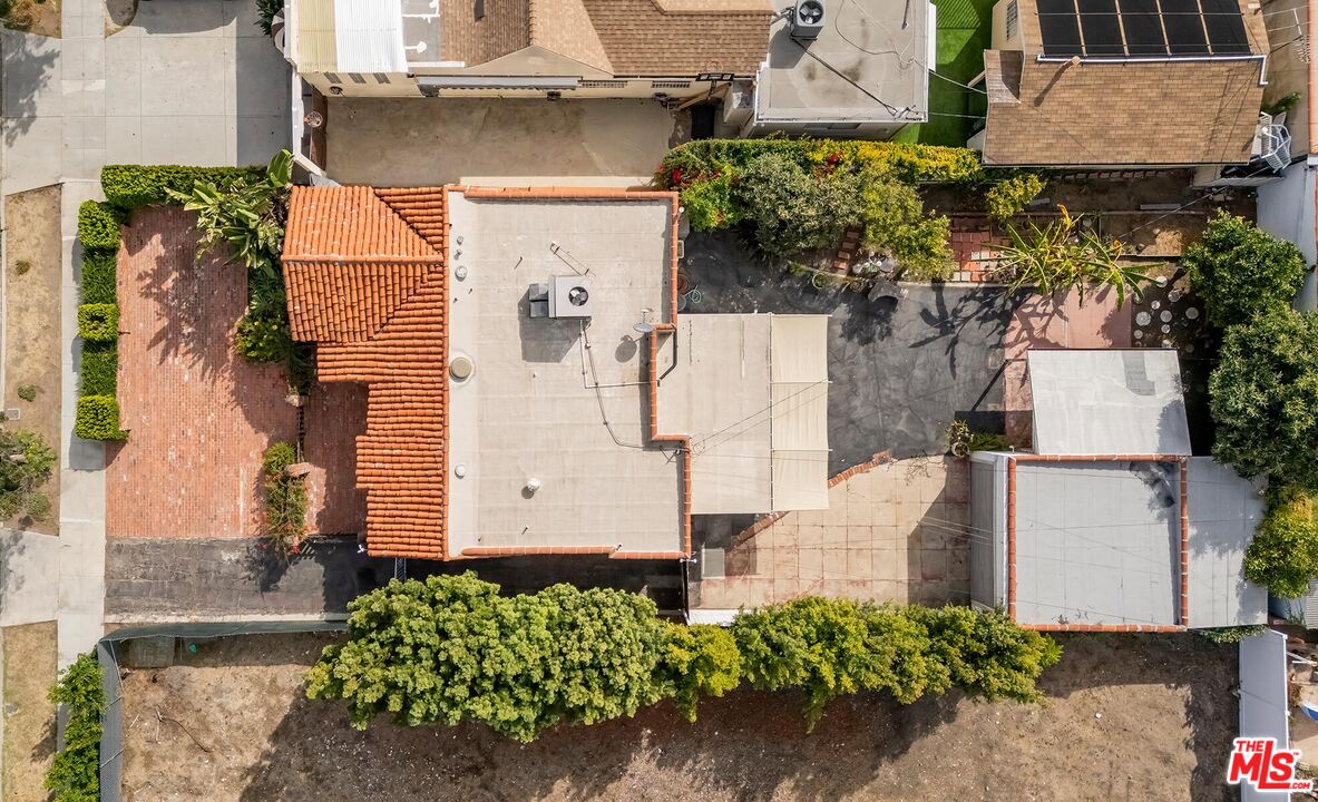 155 Le Doux Road Beverly Hills, CA 90211 - Photo 2 of 12 an aerial view of a house with a yard and fountain