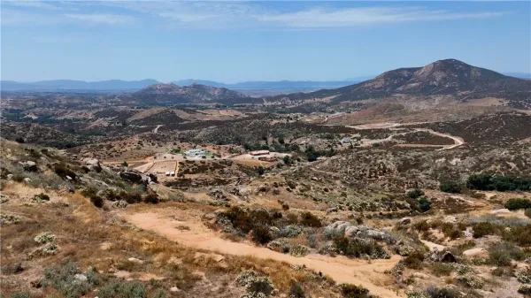 an aerial view of residential house and green space