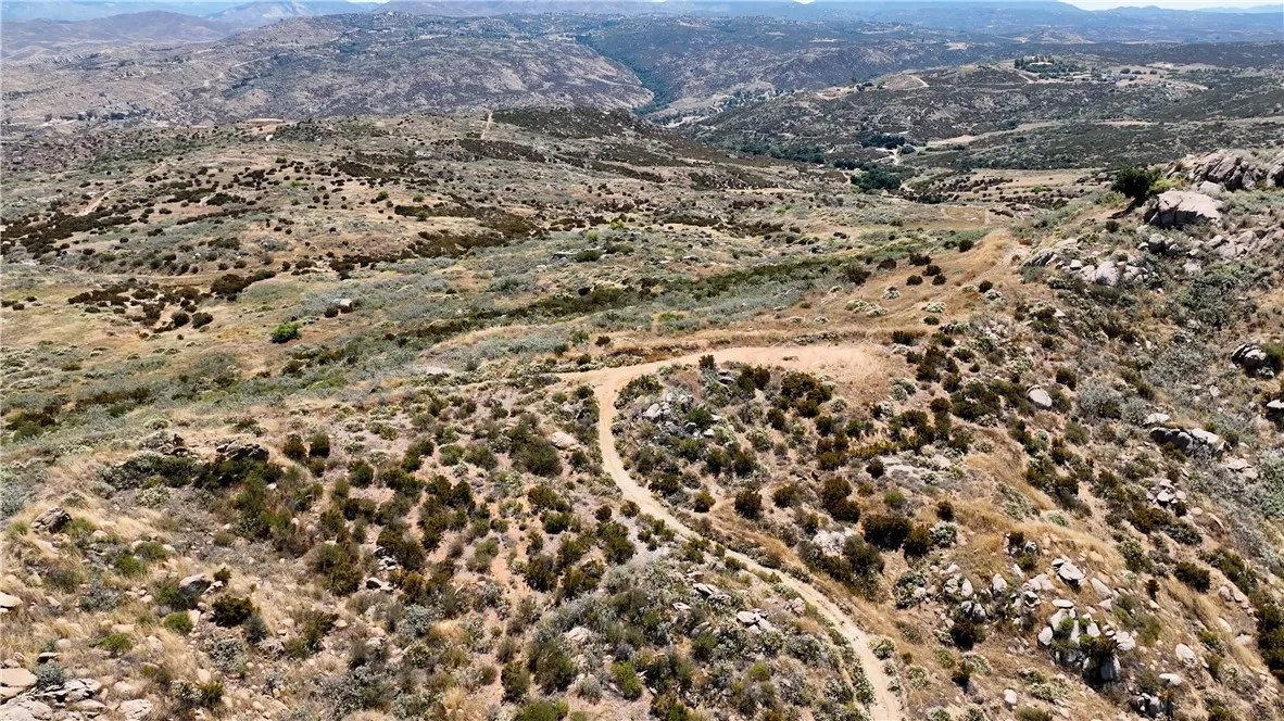1 Newby Temecula, CA 92592 - Photo 6 of 9 an aerial view of house with yard and mountain view in back