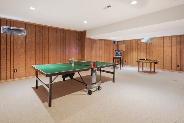 a living room with furniture and a table
