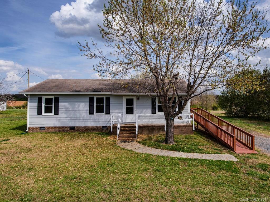 5117 Austin Road Monroe, NC 28112 - Photo 1 of 19 a front view of a house with garden