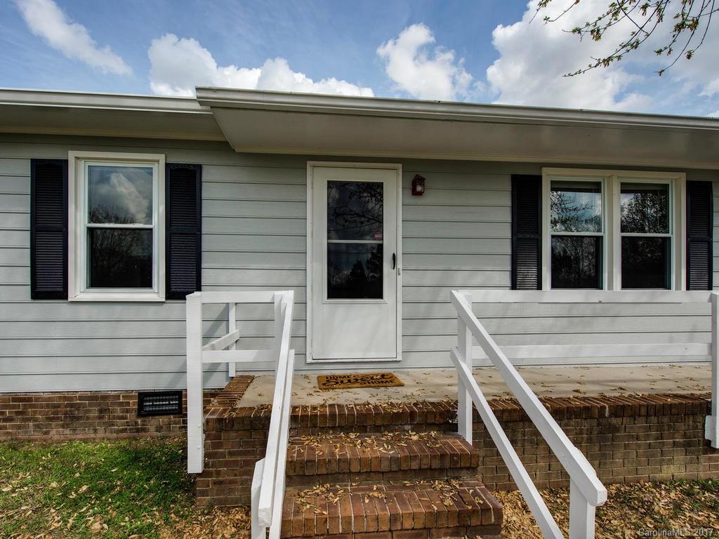5117 Austin Road Monroe, NC 28112 - Photo 2 of 19 a front view of a house with a garage