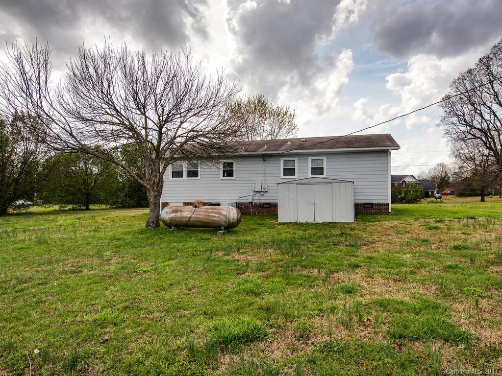 5117 Austin Road Monroe, NC 28112 - Photo 18 of 19 a front view of house with yard and trees
