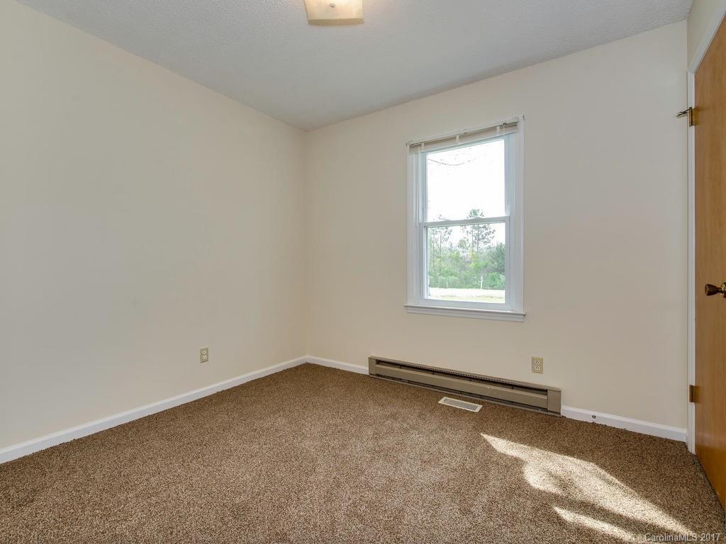 5117 Austin Road Monroe, NC 28112 - Photo 10 of 19 an empty room with a window