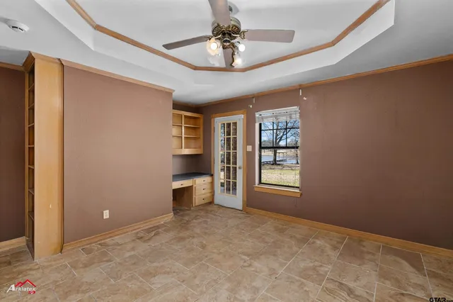a view of a table and chairs in the patio