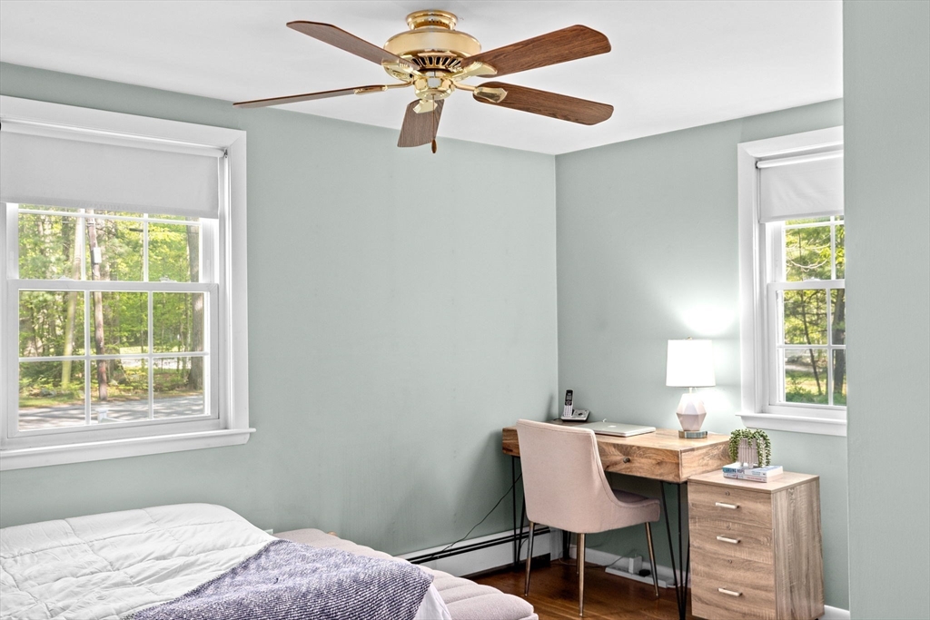 154 Mann Road Scituate, MA 02066 - Photo 17 of 34 a bedroom with a workspace