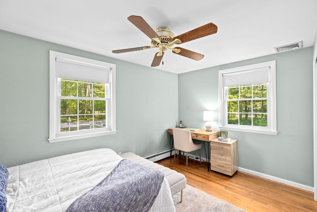 154 Mann Road Scituate, MA 02066 - Photo 18 of 34 a workspace with a window and furniture