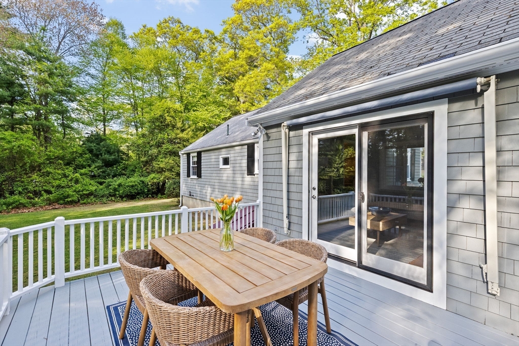 154 Mann Road Scituate, MA 02066 - Photo 19 of 34 a view of a chair and table in the balcony