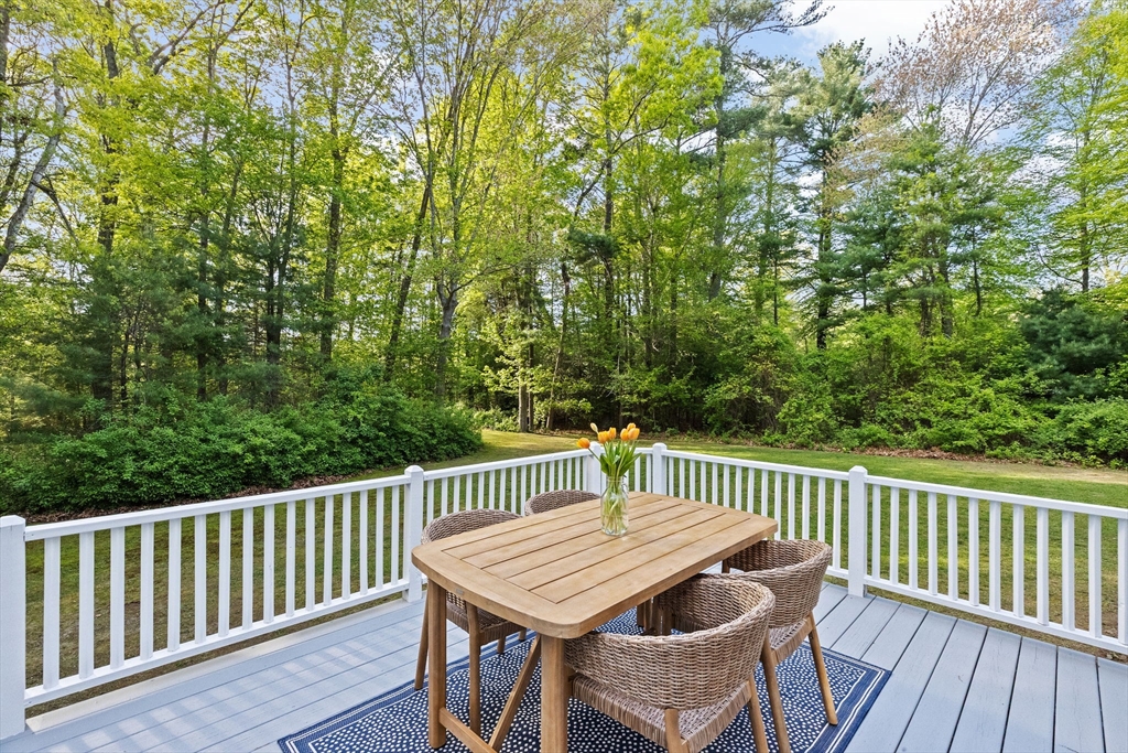 154 Mann Road Scituate, MA 02066 - Photo 31 of 34 a view of a wooden chairs and table in the deck