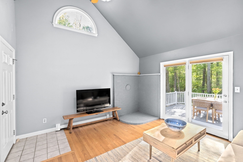 154 Mann Road Scituate, MA 02066 - Photo 4 of 34 a living room with furniture and a flat screen tv