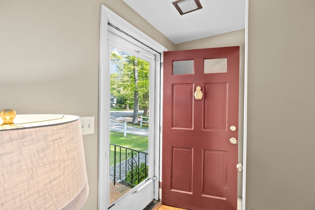 154 Mann Road Scituate, MA 02066 - Photo 9 of 34 a front view of a house with a large window