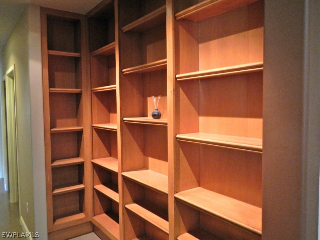 20150 North River Road Alva, FL 33920 - Photo 14 of 25 a view of walk in closet with empty racks