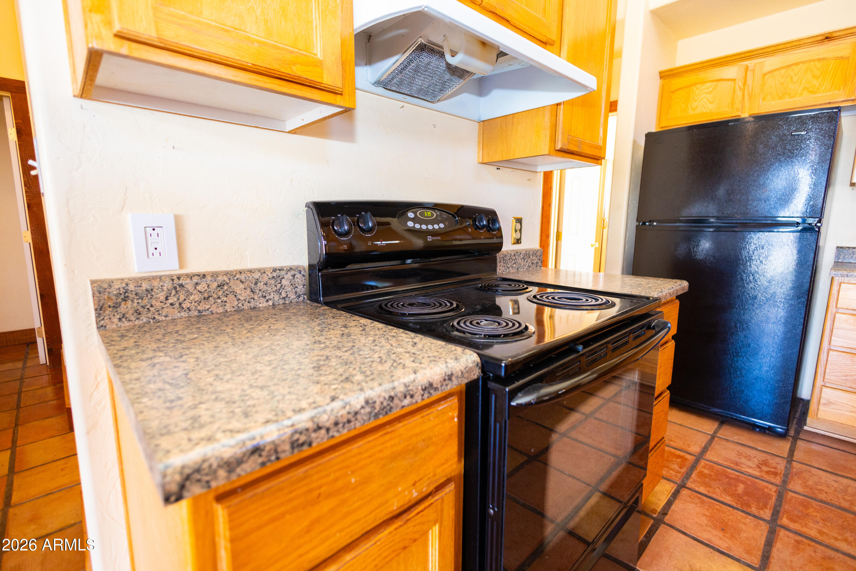 4105 North Washington Avenue Douglas, AZ 85607 - Photo 43 of 61 a kitchen view with a stove and a refrigerator