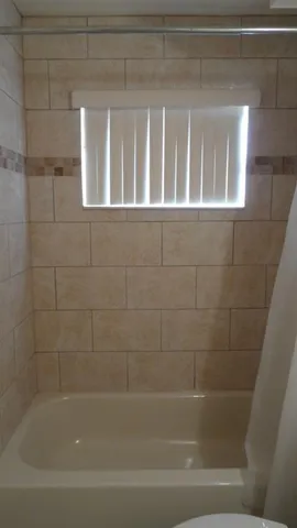 a view of backyard with green space