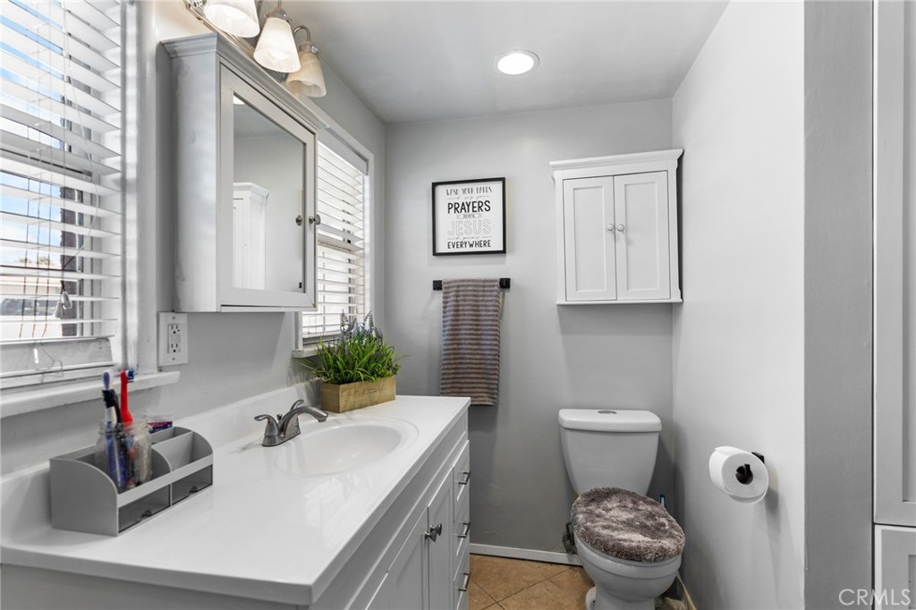 1005 North Encina Avenue Rialto, CA 92376 - Photo 23 of 39 a bathroom with a sink toilet and shower