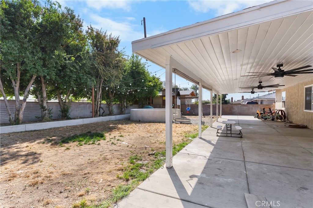 1005 North Encina Avenue Rialto, CA 92376 - Photo 32 of 39 a view of a backyard with sitting area