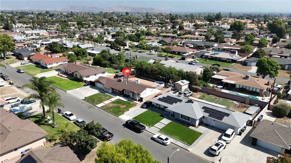 1005 North Encina Avenue Rialto, CA 92376 - Photo 36 of 39 an aerial view of a city with lots of residential buildings