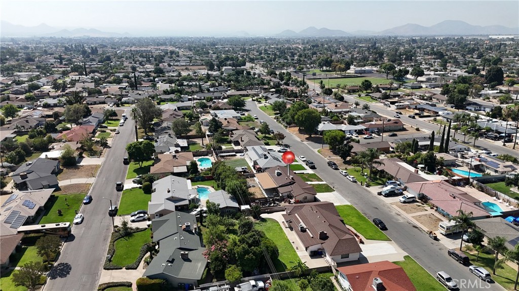 1005 North Encina Avenue Rialto, CA 92376 - Photo 39 of 39 an aerial view of a city with lots of residential buildings