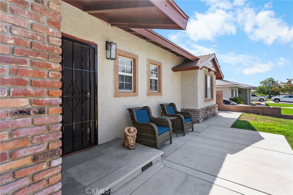 1005 North Encina Avenue Rialto, CA 92376 - Photo 4 of 39 a view of a house with backyard and sitting area