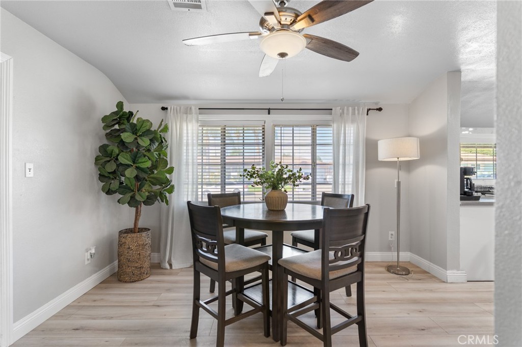 1005 North Encina Avenue Rialto, CA 92376 - Photo 7 of 39 a dining room with furniture and window