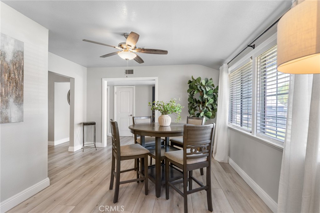 1005 North Encina Avenue Rialto, CA 92376 - Photo 8 of 39 a view of a dining room with furniture and window