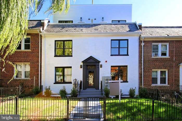 Charming brick facade with modern accents.