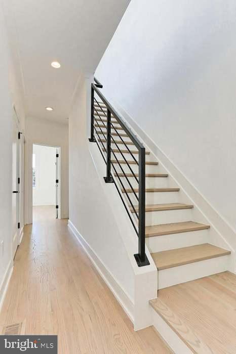 1313 Orren Street Northeast, Unit 3 Washington, DC 20002 - Photo 19 of 24 Modern staircase with sleek design elements.